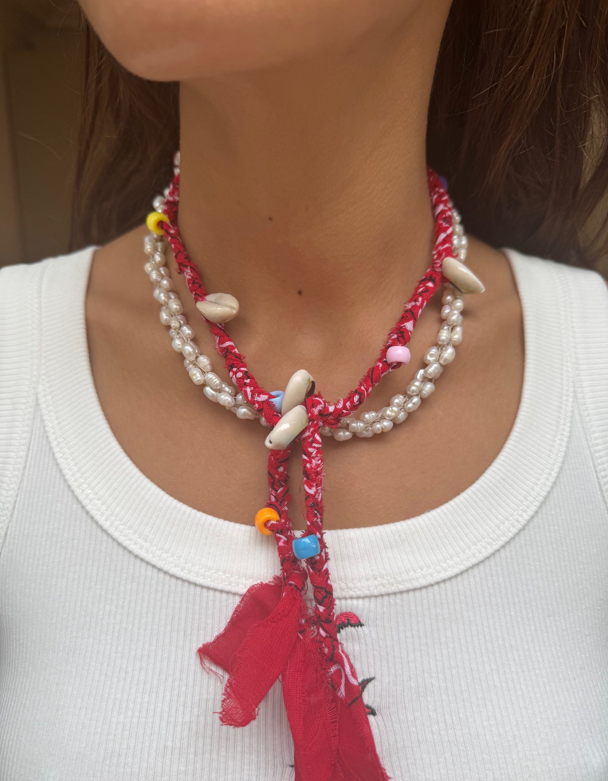Collier coquillage rouge