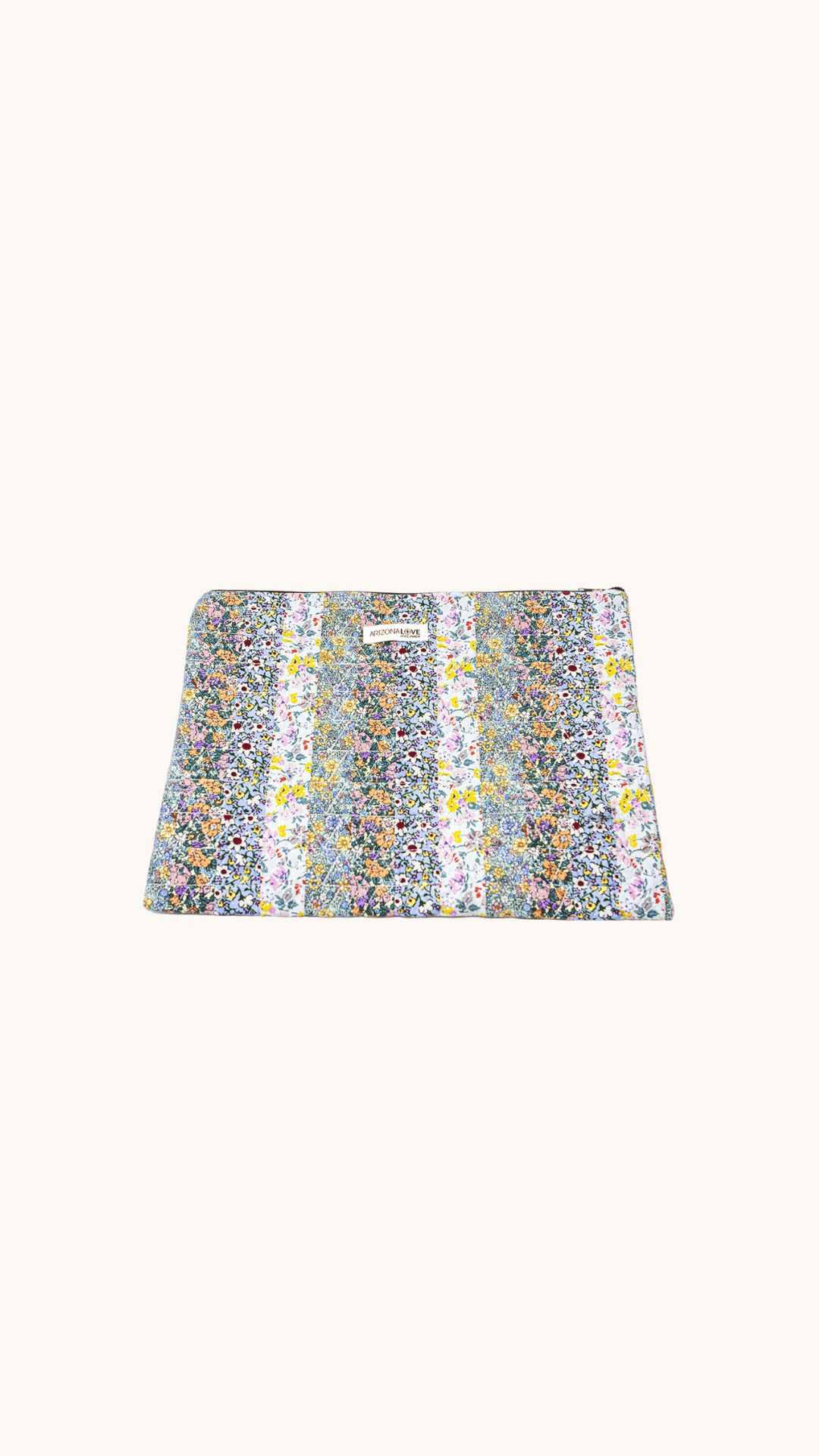 Pochette matelassée fleurie